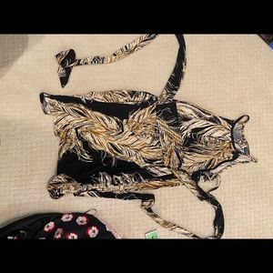 Black dress with gold peacock feathers